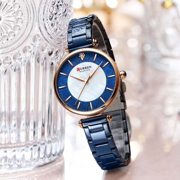 Γυναικείο ρολόι Curren 9072 Blue, με μπλε και λευκό καντράν με ροζ χρυσές λεπτομέρειες