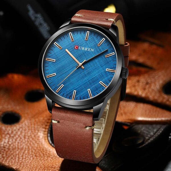 Ανδρικό ρολόι Curren 8386 Blue, με καφέ δερμάτινο λουράκι και καντράν με ροζ χρυσές λεπτομέρειες
